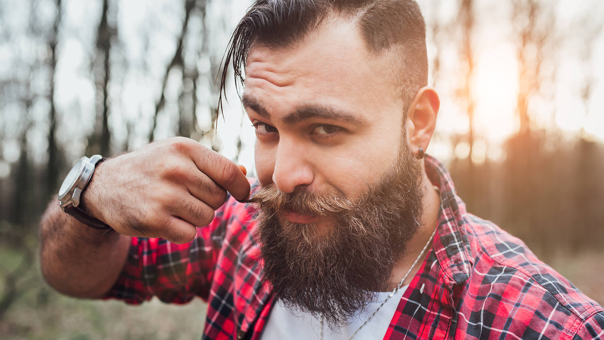 Man with beard in the woods
